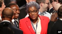 FILE - Then-Democratic Party Chairwoman Donna Brazile talks with audience members before the debate between Republican vice presidential nominee Mike Pence and Democratic vice presidential nominee Tim Kaine at Longwood University in Farmville, Va., Oct. 4, 2016.