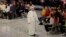 Pope Francis leaves the Paul VI hall at the end of his meeting with youths attending the Synod, at the Vatican, Oct. 6, 2018. 
