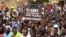 FILE - Nigeriens gather in a street to protest against the U.S. military presence, in Niamey, Niger April 13, 2024. 