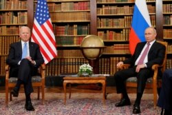 FILE - US President Joe Biden and Russia's President Vladimir Putin meet at Villa La Grange in Geneva, Switzerland, June 16, 2021.