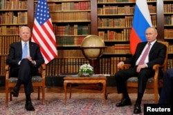 FILE - US President Joe Biden and Russia's President Vladimir Putin meet at Villa La Grange in Geneva, Switzerland, June 16, 2021.