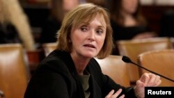 Marilyn Tavenner, administrator of the Centers for Medicare & Medicaid Services, testifies before a House Ways and Means Committee hearing on "Affordable Care Act Implementation on Capitol Hill in Washington, Oct. 29, 2013. 