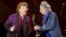 FILE - British veteran rockers The Rolling Stones lead singer Mick Jagger sings next to band member Keith Richards, as they open their North American "Zip Code" tour in San Diego, California, May 24, 2015.   