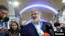 FILE - Ukrainian business tycoon Ihor Kolomoisky speaks with journalists at the Yalta European Strategy annual meeting in Kyiv, Ukraine, Sept. 13, 2019.