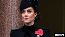 Britain's Catherine, Princess of Wales looks on from a balcony on the day of the annual Remembrance Sunday ceremony at The Cenotaph on Whitehall, in London, Nov. 10, 2024. 