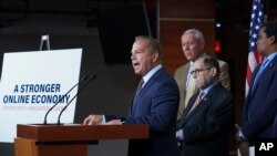 From left, Rep. David Cicilline, D-R.I., Rep. Ken Buck, R-Colo., Rep. Jerrold Nadler, D-N.Y., and Rep. Joe Neguse, D-Colo. speaks to reporters about antitrust bills to be introduced at the Capitol in Washington, June 16, 2021.