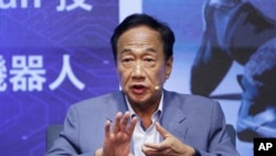 FILE - Chief Executive Officer of Hon Hai Precision Industry (Foxconn) Terry Gou delivers a speech during a media event in Taipei, Taiwan, April 30, 2023.