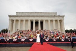 President Donald Trump and first lady Melania Trump arrive at an Independence Day celebration in front of the Lincoln Memorial, Thursday, July 4, 2019, in Washington.