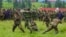 M23 soldiers demonstrate unarmed combat at Rumangabo military camp, North Kivu April 27, 2013. Rebels are honing their ambush skills to prepare to face a new United Nations force which has a mandate to go on the offensive. 