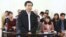 FILE - Vietnam's prominent blogger Nguyen Huu Vinh, shown on trial in Hanoi, Vietnam.