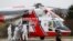 Medical workers transport a coronavirus disease (COVID-19) patient, who is being transferred from a Brno hospital by a Czech Air Force helicopter, in Prague, Czech Republic, Nov. 25, 2021.