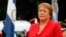 FILE - Chile's President Michelle Bachelet, pictured at a ceremony in Buenos Aires in 2014, says new anti-corruption measures will end influence peddling and allow greater oversight of political finances. 