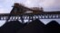 Coal is unloaded onto large piles at the Ulan Coal mines near the central New South Wales town of Mudgee in Australia, March 8, 2018. 