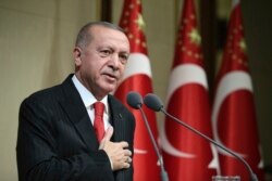 Turkish President Recep Tayyip Erdogan speaks during a reception on Republic Day, in Ankara, Turkey, Oct. 29, 2019.