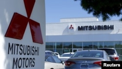 FILE - A Mitsubishi Motors dealership is shown in Poway, California, July 27, 2015. 