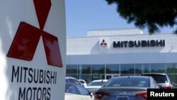 FILE - A Mitsubishi Motors dealership is shown in Poway, California, July 27, 2015. 