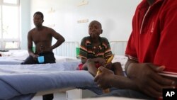FILE - Typhoid patients in Harare, Zimbabwe.