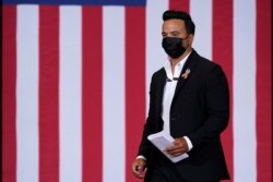 Performer Luis Fonsi arrives to speak at a Hispanic Heritage Month event featuring Democratic presidential candidate former Vice President Joe Biden, Tuesday, Sept. 15, 2020, at Osceola Heritage Park in Kissimmee, Fla.