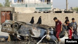 ລົດທີ່ຖືກລະເບີດ ໃນເມືອງ Mahmudiya