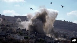 Se observa una explosión durante una operación militar israelí en la ciudad cisjordana de Yenín, el jueves 5 de septiembre de 2024. (Foto AP/Majdi Mohammed)