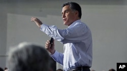 Republican presidential candidate, former Massachusetts Governor Mitt Romney campaigns at Ring Power Lift Trucks in Jacksonville, Florida, January 30, 2012.