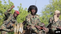 FILE - Chadian soldiers of the Joint Task Force fighting Boko Haram jihadists are seen on patrol in Monguno, Nigeria, Dec. 15, 2019.