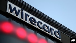 ARHIVA - Logo kompanije Wirecard sa sjedištem u Minhenu (Foto: AP/Matthias Schrader)