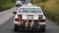 Central American migrants, part of the caravan hoping to reach the U.S. border, a ride on in the trunk of a taxi, in Acayucan, Veracruz state, Mexico, Nov. 3, 2018.