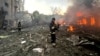 This handout photograph taken and released by the Ukrainian Emergency Service on Sept. 29, 2024, shows rescuers working at the site of a missile attack in Zaporizhzhia. 