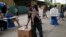 A man votes in Guayaquil, Ecuador, Aug. 20, 2023. The special election was called after President Guillermo Lasso dissolved the National Assembly by decree in May to avoid being impeached. 