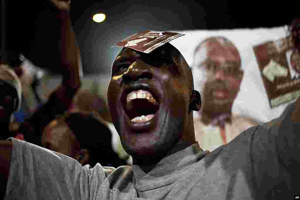 A Sall supporter celebrates in the capital Dakar, March 25, 2012. (Reuters)