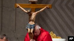 FILE—Pope Francis leads the liturgy of the Passion on Good Friday in St. Peter's Basilica at The Vatican, March 29, 2024.