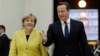 Merkel Downplays Chance of Eurozone Exit by Greece