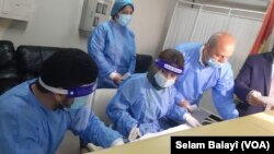 Desteya doktor û peristyaran li nexweşxaneke bajarê Duhok 