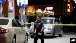 Garden Grove police work the scene of a stabbing in Garden Grove, California, Aug. 7, 2019. 