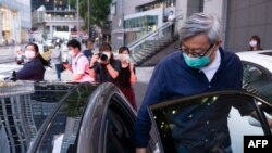 Fung Wai-kong, managing editor for shuttered pro-democracy newspaper Apple Daily's English website, leaving the police headquarters in Hong Kong June 29, 2021, after he was released on bail following his arrest under the National Security Law.