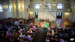 German Lutheran Bishop Petra Bosse-Huber speaks at a ceremony commemorating the people killed in the the Herero and Nama uprising between 1904 and 1908 in Berlin, Aug. 29, 2018 before the repatriation of the remains to Namibia. 