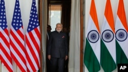 FILE - Indian Prime Minister Narendra Modi in New Delhi, Jan. 25, 2015. The warm ties between India U.S. are being tested after U.S. prosecutors accused an Indian official of orchestrating an alleged assassination plot in New York City. 