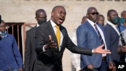 FILE —Zimbabwe's main opposition leader Nelson Chamisa speaks at the funeral of Moreblessing Ali, one of his supporters, in Nyatsime, Harare, June, 14, 2022.