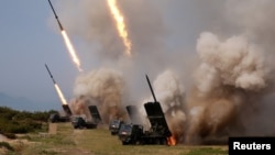 North Korean military conducts a "strike drill" for multiple launchers and tactical guided weapon into the East Sea during a military drill in this May 4, 2019, photo supplied by the Korean Central News Agency (KCNA).