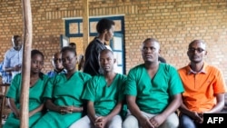 Four journalists of Burundi's independent media Iwacu Press Group and their driver appear at the High Court in Bubanza, western Burundi, Dec. 30, 2019, accused of complicity in endangering the internal security of the state. 