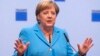 Facing Far-right Protest, Merkel Pledges Action over Failed Asylum Seekers