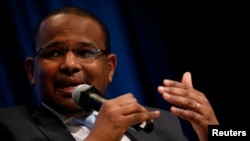 FILE - Malian Minister of Economy and Finance Boubou Cisse speaks at panel on the security-development nexus during IMF spring meetings in Washington, U.S., April 20, 2018