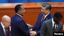 FILE - Republic of the Congo President Denis Sassou Nguesso and Chinese President Xi Jinping shake hands at the opening ceremony of the ninth Forum on China-Africa Cooperation (FOCAC) Summit, in Beijing, China, Sept. 5, 2024.