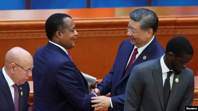 FILE - Republic of the Congo President Denis Sassou Nguesso and Chinese President Xi Jinping shake hands at the opening ceremony of the ninth Forum on China-Africa Cooperation (FOCAC) Summit, in Beijing, China, Sept. 5, 2024.