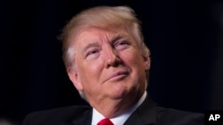 President Donald Trump listens as he is introduced during the National Prayer Breakfast, Feb. 2, 2017, in Washington, D.C.