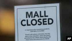 8일 미국 유타즈 솔트레이크시티의 한 쇼핑몰에 문을 닫았다는 안내문이 붙어있다.
