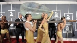 Lady Gaga arrives inside an egg at the Grammy Awards