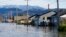 FILE - Floodwater inundates homes in Sumas, Wash., on Nov. 17, 2021.