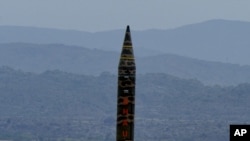 In this Wednesday, Nov. 28, 2012 photo released by Inter Services Public Relations department, Pakistan-made Hatf V or Ghauri missile is launched from an undisclosed location in Pakistan.